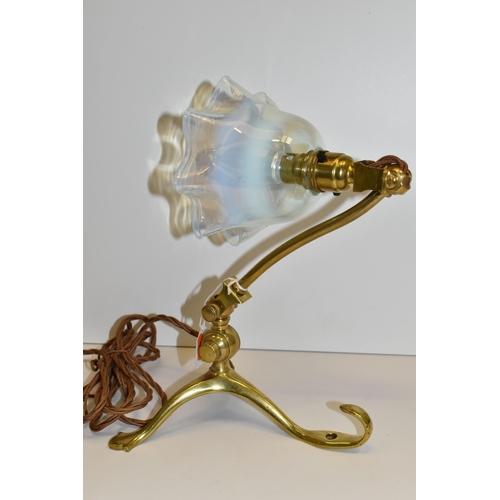 490 - A W. A. S. BENSON ARTS AND CRAFTS TABLE LAMP, with brass three-footed base, stamped 'Benson' on the ... 