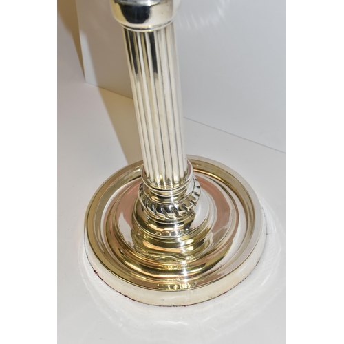 494 - A VICTORIAN STYLE CRANBERRY COLOURED GLASS OIL LAMP, with circular silver coloured Corinthian column... 