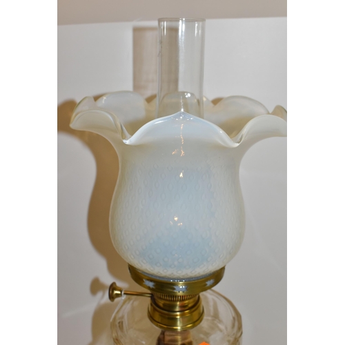 495 - A VICTORIAN STYLE OIL LAMP, brass Corinthian column, stepped square base, clear glass facet cut rese... 