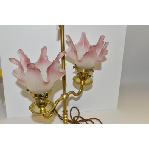 496 - A BRASS BOUDOIR TABLE LAMP, with two Art Deco style frosted white and pink glass shades, appears to ... 