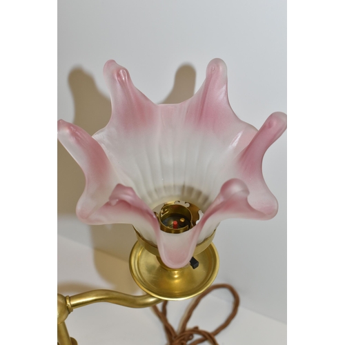 496 - A BRASS BOUDOIR TABLE LAMP, with two Art Deco style frosted white and pink glass shades, appears to ... 