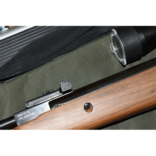 499 - A SMK 19-18 .22 BREAK BARREL AIR RIFLE, no visible serial number, fitted with a Righter Optik 3-9x40... 