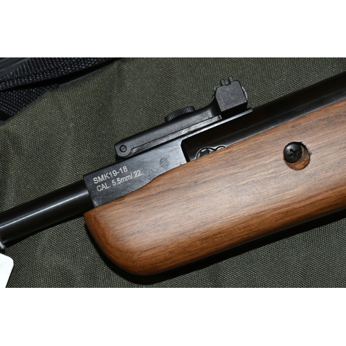 499 - A SMK 19-18 .22 BREAK BARREL AIR RIFLE, no visible serial number, fitted with a Righter Optik 3-9x40... 