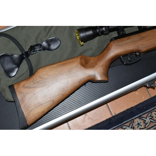 499 - A SMK 19-18 .22 BREAK BARREL AIR RIFLE, no visible serial number, fitted with a Righter Optik 3-9x40... 