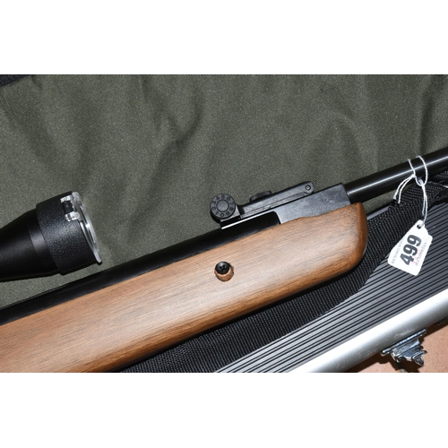 499 - A SMK 19-18 .22 BREAK BARREL AIR RIFLE, no visible serial number, fitted with a Righter Optik 3-9x40... 