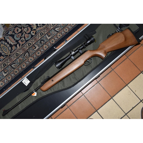 499 - A SMK 19-18 .22 BREAK BARREL AIR RIFLE, no visible serial number, fitted with a Righter Optik 3-9x40... 