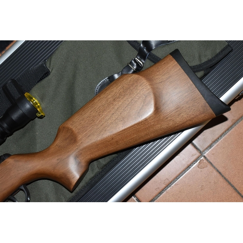 499 - A SMK 19-18 .22 BREAK BARREL AIR RIFLE, no visible serial number, fitted with a Righter Optik 3-9x40... 