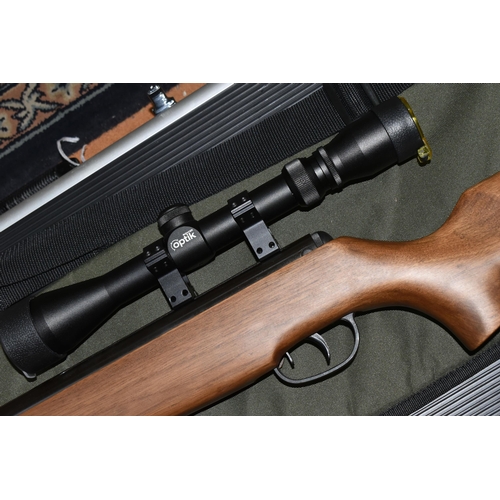 499 - A SMK 19-18 .22 BREAK BARREL AIR RIFLE, no visible serial number, fitted with a Righter Optik 3-9x40... 