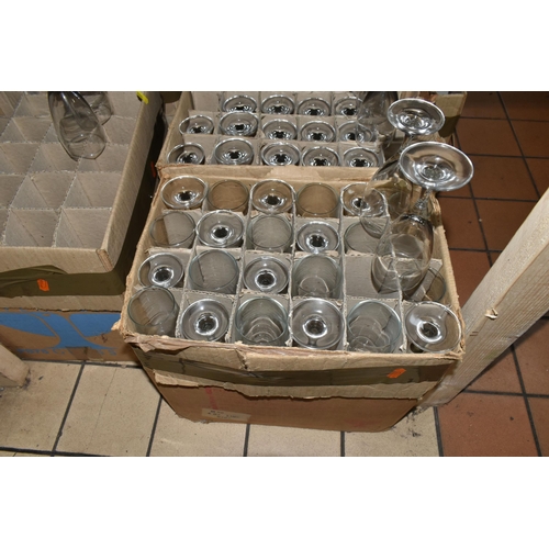 502 - TWELVE BOXES OF MOSTLY RAVENHEAD WHOLESALE GLASSES to include wine glasses, brandy glasses, aperitif... 