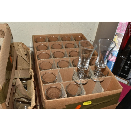 502 - TWELVE BOXES OF MOSTLY RAVENHEAD WHOLESALE GLASSES to include wine glasses, brandy glasses, aperitif... 