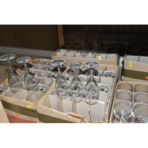 502 - TWELVE BOXES OF MOSTLY RAVENHEAD WHOLESALE GLASSES to include wine glasses, brandy glasses, aperitif... 