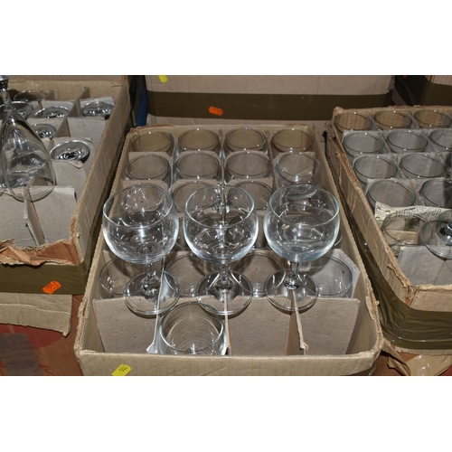 502 - TWELVE BOXES OF MOSTLY RAVENHEAD WHOLESALE GLASSES to include wine glasses, brandy glasses, aperitif... 