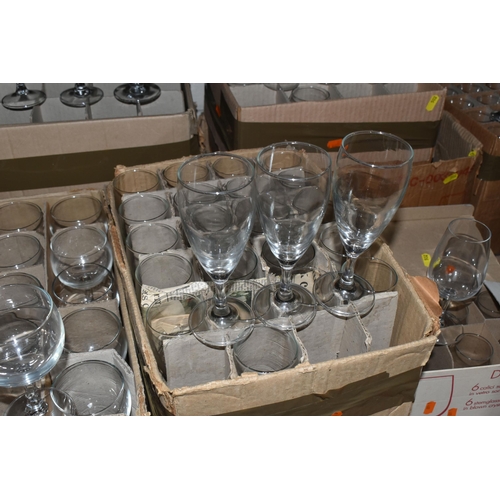 502 - TWELVE BOXES OF MOSTLY RAVENHEAD WHOLESALE GLASSES to include wine glasses, brandy glasses, aperitif... 