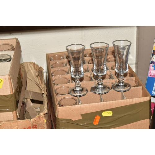 502 - TWELVE BOXES OF MOSTLY RAVENHEAD WHOLESALE GLASSES to include wine glasses, brandy glasses, aperitif... 