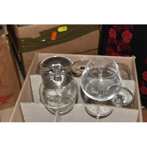 502 - TWELVE BOXES OF MOSTLY RAVENHEAD WHOLESALE GLASSES to include wine glasses, brandy glasses, aperitif... 