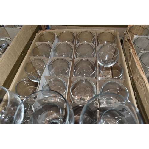 502 - TWELVE BOXES OF MOSTLY RAVENHEAD WHOLESALE GLASSES to include wine glasses, brandy glasses, aperitif... 