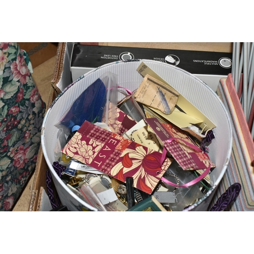 505 - TWO BOXES AND LOOSE ARTS AND CRAFTS SUPPLIES to include a group of embroidered textiles, buttons, fa... 