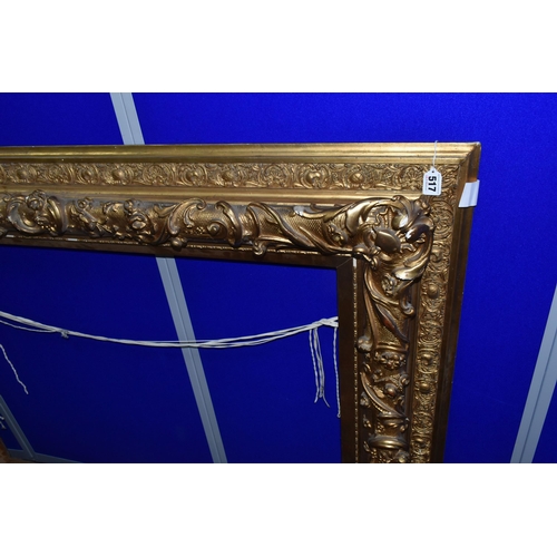 517 - A LARGE DECORATIVE MOULDED PICTURE FRAME, bears an attribution plaque for Pietro Toretti ( 1888-1927... 