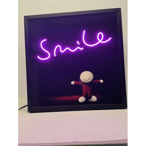 305 - DOUG HYDE (BRITISH 1972) 'KEEP SMILING', a limited edition illuminated print, depicting a smiling fi... 