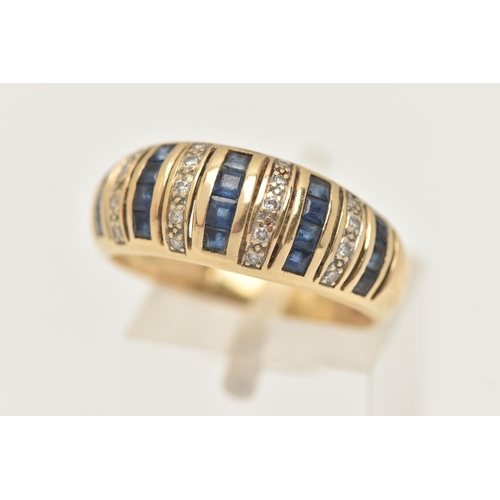 1 - A SAPPHIRE AND DIAMOND DRESS RING, designed as graduated vertical lines of square shape sapphires an... 