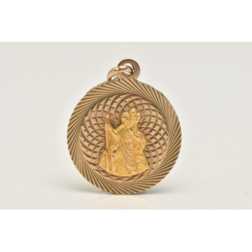 19 - A 9CT GOLD ST.CHRISTOPHER PENDANT, of a circular form with diamond cut pattern, engraved to the reve... 