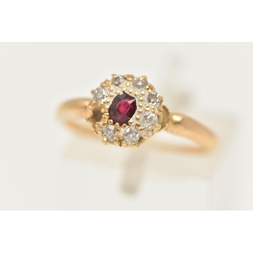 2 - A RUBY AND DIAMOND CLUSTER RING, designed as a central oval shape ruby within an old cut diamond sur... 