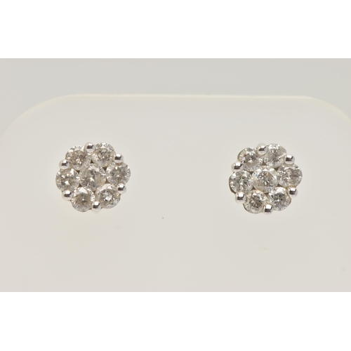 39 - A PAIR OF 9CT GOLD DIAMOND CLUSTER EARRINGS, white gold mounts, approximate width 7.5mm, each earrin... 