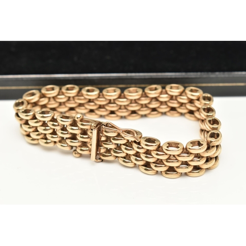 45 - A HEAVY 9CT GOLD CHAIN BRACELET, a yellow gold brick link style chain, fitted with an integrated pus... 