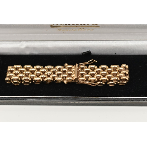 45 - A HEAVY 9CT GOLD CHAIN BRACELET, a yellow gold brick link style chain, fitted with an integrated pus... 