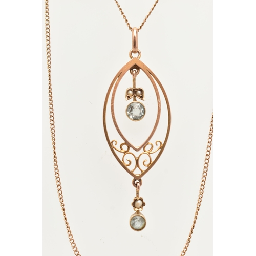 48 - AN EARLY 20TH CENTURY LAVALIER PENDANT AND CHAIN, a navette form open work pendant fitted with two d... 