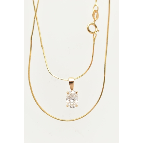 49 - A 14CT GOLD NECKLACE, an oval cut cubic zirconia, prong set in yellow gold, fitted with a slightly t... 