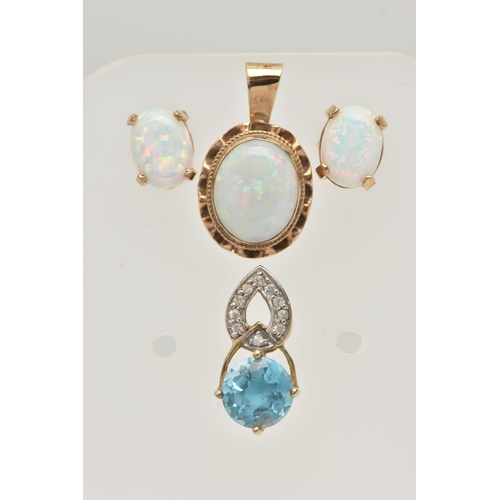 56 - A SMALL ASSORTMENT OF JEWELLERY, to include a yellow metal and opal pendant, unmarked, a blue topaz ... 