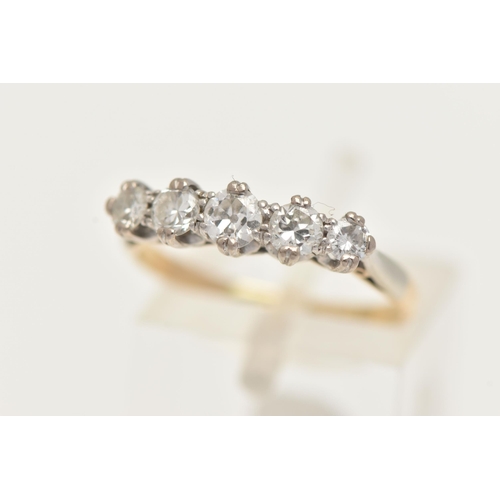 61 - A FIVE STONE DIAMOND RING, a central old cut diamond with two round brilliant cut diamonds either si... 