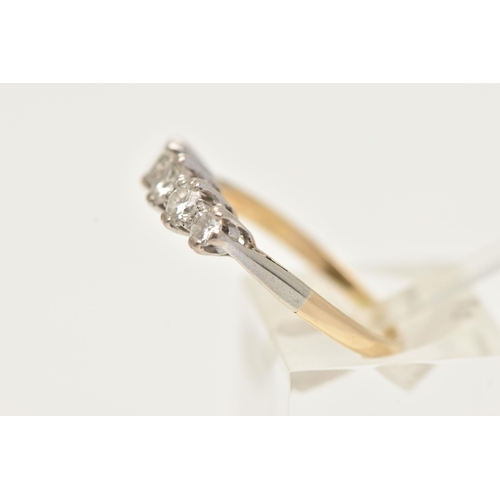 61 - A FIVE STONE DIAMOND RING, a central old cut diamond with two round brilliant cut diamonds either si... 