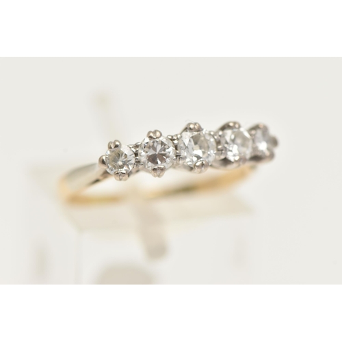 61 - A FIVE STONE DIAMOND RING, a central old cut diamond with two round brilliant cut diamonds either si... 