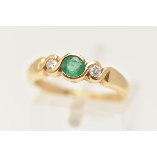 64 - AN 18CT GOLD EMERALD AND DIAMOND RING, a principally set circular cut emerald in a yellow gold twist... 