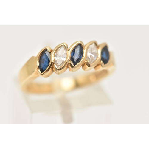 65 - AN 18CT GOLD SAPPHIRE AND DIAMOND BAND RING, designed as three blue marquise cut sapphires interspac... 