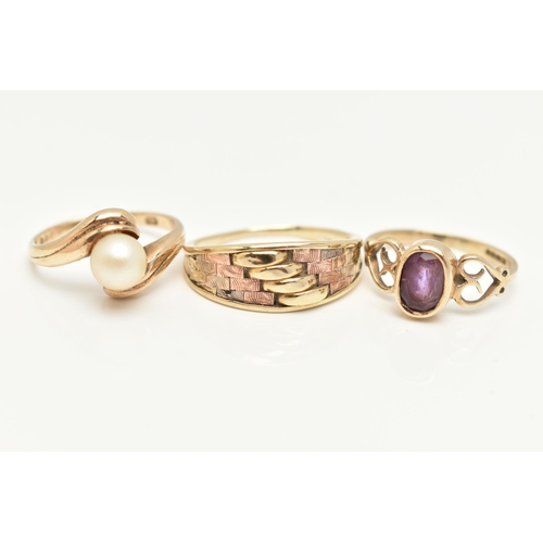 73 - THREE 9CT GOLD RINGS, the first set with an oval cut amethyst, open work heart detailed shoulders, h... 