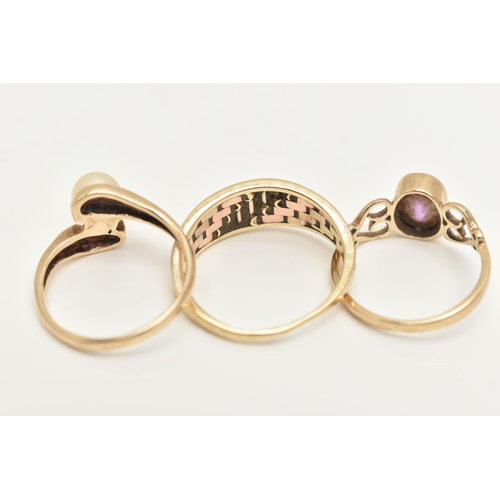 73 - THREE 9CT GOLD RINGS, the first set with an oval cut amethyst, open work heart detailed shoulders, h... 