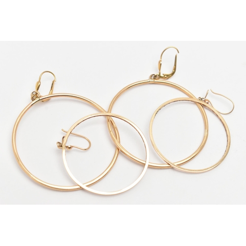 76 - TWO PAIRS OF HOOP EARRINGS, the first of a polished form, stamped 9ct, fitted with fish hook fitting... 