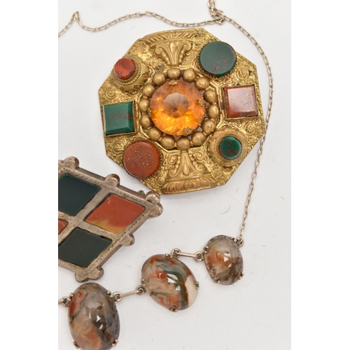 123 - FOUR ITEMS OF JEWELLERY, to include a Scottish white metal hardstone and orange paste set brooch, fi... 