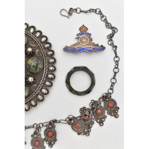 124 - SIX ITEMS OF JEWELLERY, to include a carved and faceted moss agate ring, a polished moss agate brooc... 