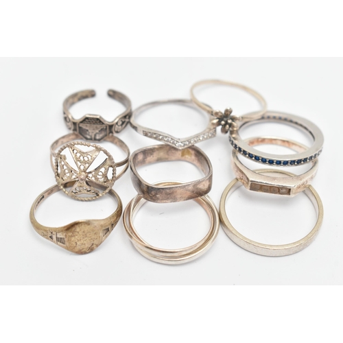 132 - TEN WHITE METAL RINGS, of various designs and sizes, some stamped 925, silver, some unmarked metal (... 