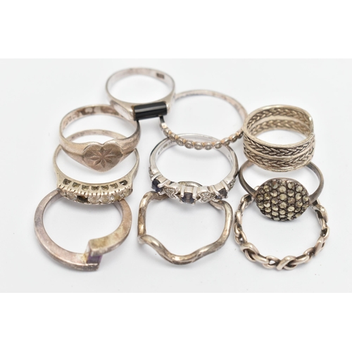133 - TEN WHITE METAL RINGS, of various designs and sizes, some stamped 925, silver, some unmarked metal, ... 