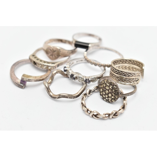 133 - TEN WHITE METAL RINGS, of various designs and sizes, some stamped 925, silver, some unmarked metal, ... 