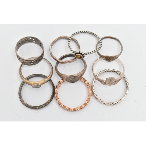 136 - TEN WHITE METAL RINGS, of various designs and sizes, some stamped 925, silver, some unmarked metal, ... 