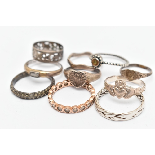 136 - TEN WHITE METAL RINGS, of various designs and sizes, some stamped 925, silver, some unmarked metal, ... 