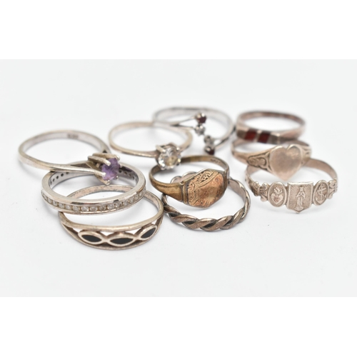 138 - TEN WHITE METAL RINGS, of various designs and sizes, some stamped 925, silver, some unmarked metal (... 