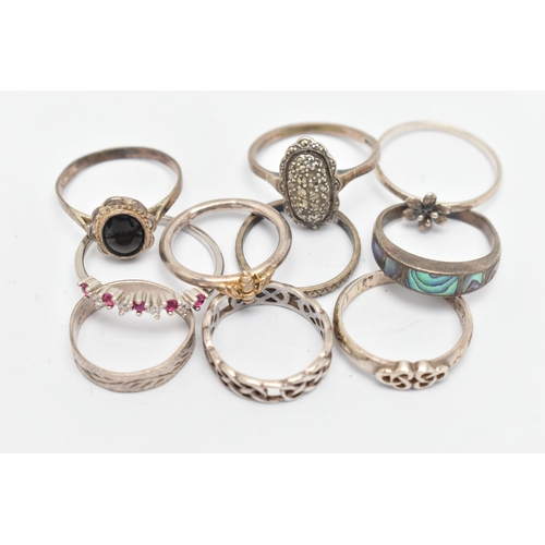 139 - TEN WHITE METAL RINGS, of various designs and sizes, some stamped 925, silver, some unmarked metal, ... 