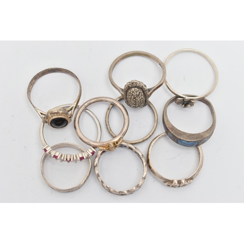 139 - TEN WHITE METAL RINGS, of various designs and sizes, some stamped 925, silver, some unmarked metal, ... 